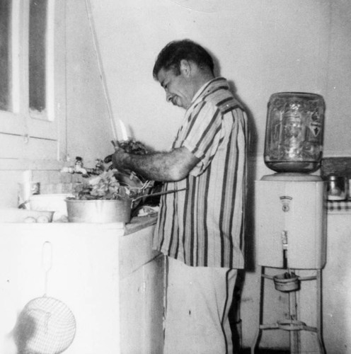 Mexican American man cooking