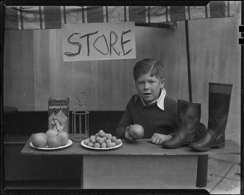 Boy playing store, Los Angeles, circa 1935