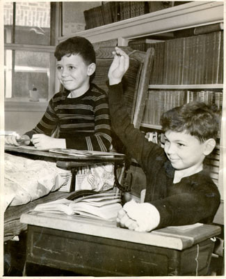 [Two children in a class at Shriners' Hospital for Crippled Children]