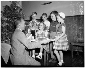 Christmas party at College of Osteopathic Physicians and Surgeons, 1953