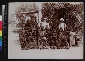 Group portrait of children and teachers, Karnataka, India, ca. 1900
