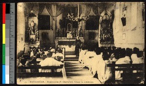 Missionary father teaching the catechism inside a church, Madagascar, ca.1920-1940