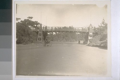 Suspension bridge across South Drive, of steel and wire, G.G.P. [i.e. Golden Gate Park]. (Now gone.) 1898