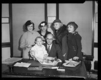 Actresses Lona Andre, Ida Lupino, Toby Wing, Grace Bradley and actor Baby Le Roy meet with Judge Marshall McComb to obtain contract approvals, Los Angeles, 1933