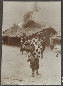 Woman with clay pot, Tanzania