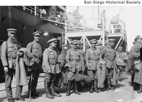 Group of Czechoslovakian soldiers on the pier next to the SS Nanking