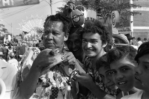Man holding a snake, Barranquilla, Colombia, 1977