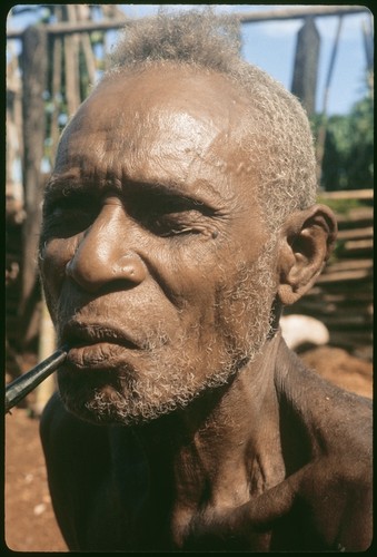 Portrait of man, smoking