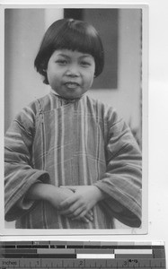 A girl who was sold into slavery at Yulin, China, 1937