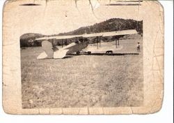Biplane in grassy field at the Sebastopol Airport