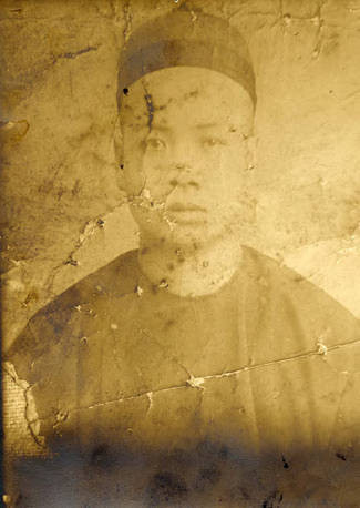 Aged photograph of Shew S. Leong before entering the United States