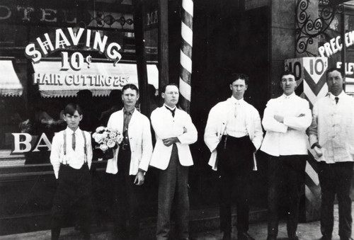 Men in Front of a Barbershop