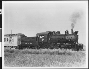 Ventura County Railway No. 2 steam engine in a grassy field, ca.1935