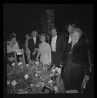 Otis Chandler (center) with wife Marilyn Brant (left) mother Dorothy Buffum Chandler and sons at the Las Madrinas Ball, 1973