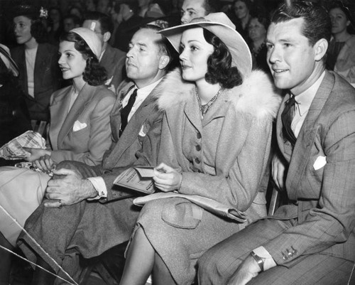 Rita Hayworth and group enjoy Roller Derby