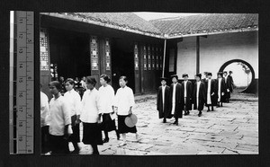 Graduates and students walking into commencement, Nanjing, Jiangsu, China, 1922