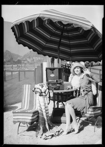Publicity shots with Ina Claire on roof, Southern California, 1929