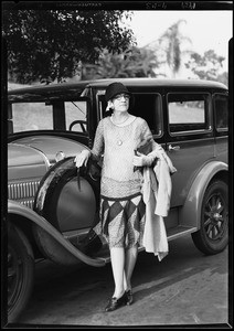 Mrs. Hood standing by car, Southern California, 1929