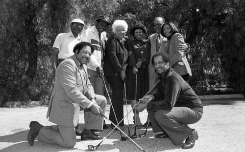 Consolidated Realty Board golf tournament participants posing together, Los Angeles, 1982