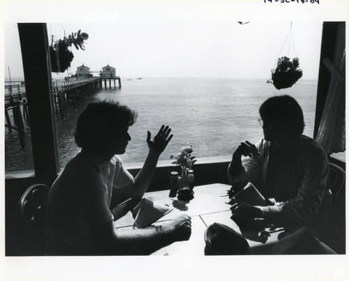 Pepperdine students dining in Alice's Restaurant on the Malibu Pier, 1979