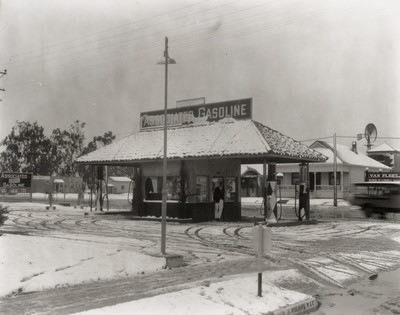 Stockton - Views - 1921 - 1941: N. Wilson Way, snow, Associated Gasoline
