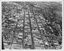 Aerial view of Santa Rosa, California showing Fourth Street running through center of photograph and Highway 101 in lower section, 1955