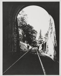 Men and train outside railroad tunnel near Cloverdale