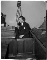 J.W. Buzzell sits in court during his trial for reckless driving, Los Angeles, 1940