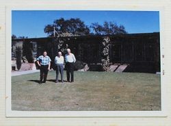 Donald O. Hallberg, cousin Joel Pearson and Oscar A. Hallberg standing in front of O. A. Hallberg and Sons Apple Products office on Bowen Street in Graton, California, 1962