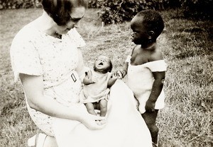 Miss Stephens with John & another motherless baby, Nigeria, ca. 1935
