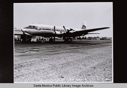 DC-7C Western Airlines airplane on the tarmac at Santa Monica Municipal Airport, July 7, 1961