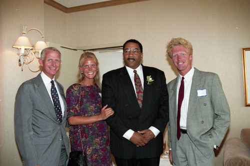Willie Williams posing with others at an event to welcome him, Los Angeles, 1992
