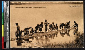 Soldiers washing clothes, Lisala, Congo, ca.1920-1940