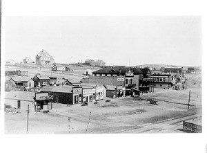 Birdseye view of early Redondo Beach, showing a commercial street and a residential area, ca.1890