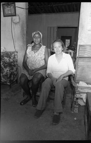 Anthropologist and woman sitting, San Basilio de Palenque, 1975