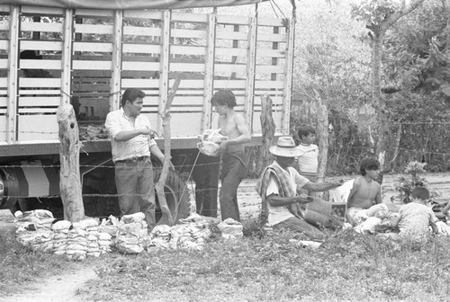 Loading the truck, La Chamba, Colombia, 1975
