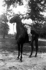 Edward Paik on horseback