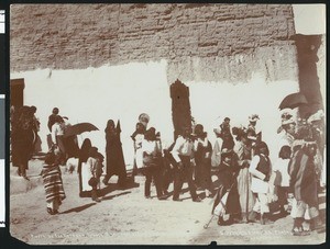 Procession leaving the church during the Fiesta de San Esteban (Saint Stephen), Acoma Pueblo, ca.1886