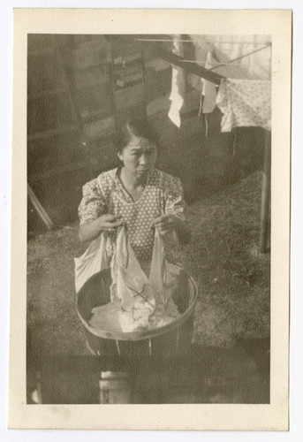 Woman with clothes basket