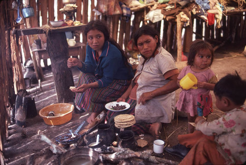 Guatemalan refugees cook, Puerto Rico, 1983