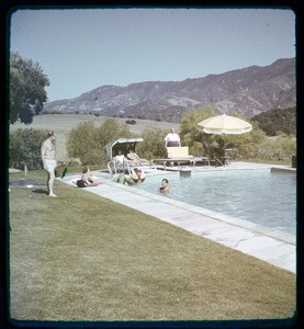 Milner family party, 7 people in & around swimming pool, Ojai, Calif., ca. 1950s