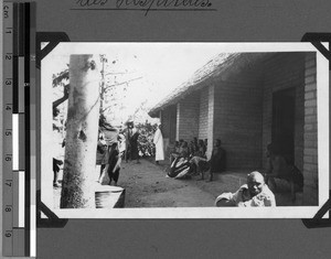 Men waiting at the hospital, Usoke, Unyamwezi, Tanzania, 1933