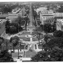 Elevated view from the California State Capitol building looking west down Capitol Ave toward Tower Bridge. State Office Building 1 is on the right and State Library is on the left