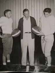 Analy High School Tigers football, 1950s--two unidentified football players with Walt Foster