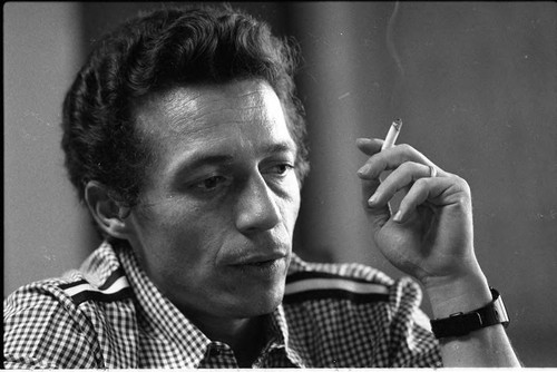 Roberto D'Aubuisson talking and smoking, San Salvador, 1982