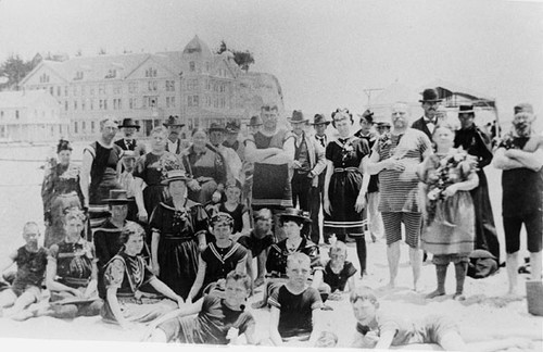 Group on the Capitola Beach with Hotel Capitola