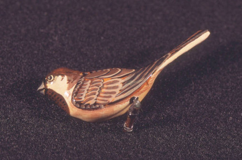 Brown and orange wooden bird pin