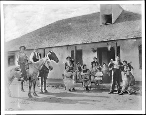 Ontivares family and friends at the adobe home of Don Pacifico Ontivares, 1925