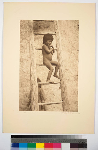 Hopiland. Arizona. The photograph shows a Hopi baby about three years old