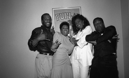 George Howard, Anita Baker, Natalie Cole, and Donnie Simpson, posing together at the 11th Annual BRE Conference, Los Angeles, 1987